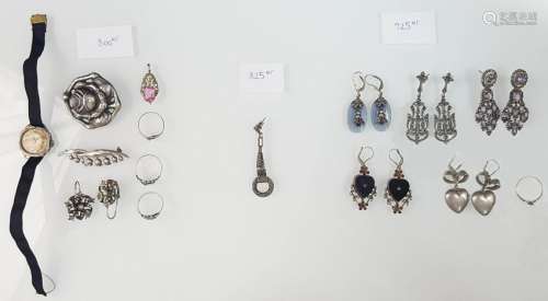 Silver jewelry. Pendants, rings, earrings, watch and