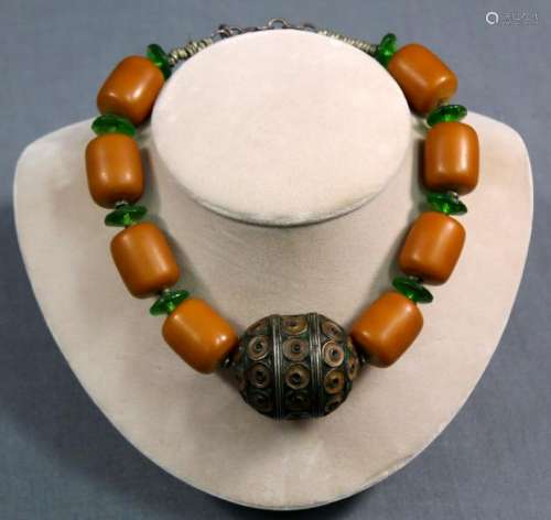 Amber necklace with metal main ball and green glass