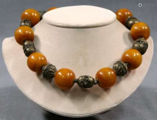 Amber necklace. Intermediate balls probably silver.