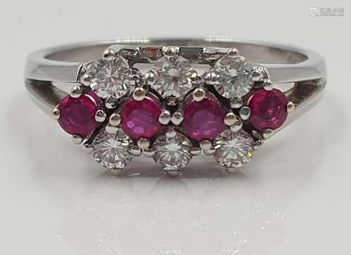 585 white gold ring, with 6 diamonds and 4 rubies.