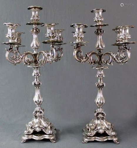 A pair of candlesticks, cilver- plated, 5 flames.