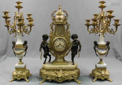 Chimney clock with two candlesticks. Fireplace set.