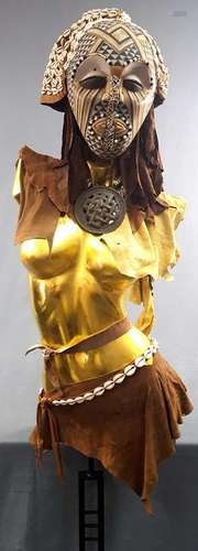 Mask, mounted on a gold-colored bust. 182 cm high with