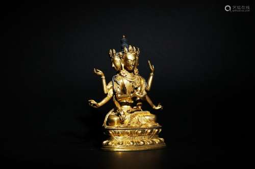 A Gilded Bronze three-headed, eight-armed Buddha