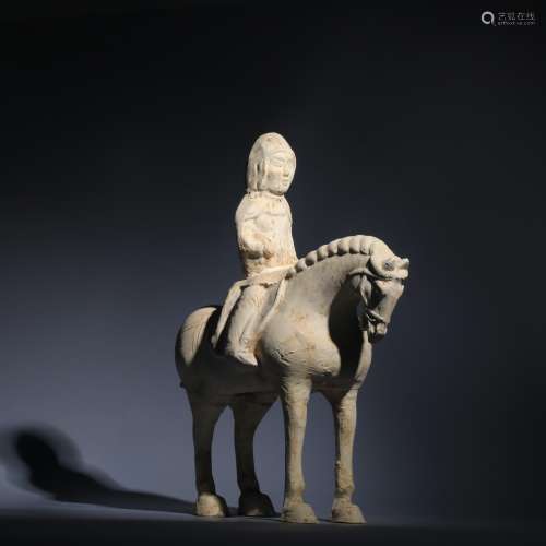 A Terra-Cotta figure riding horse