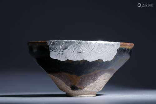 A Black-Glazed Bowl with Silver 