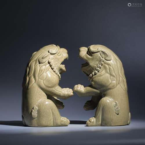 A Pair of Yue Kiln Celadon-Glazed Lion