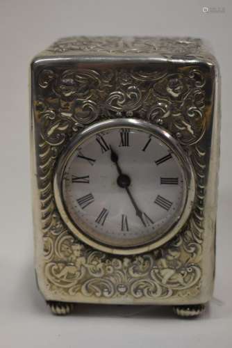 An Edwardian silver boudoir clock