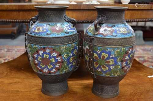 A pair of Chinese 19th century patternated spelter and champleve vases