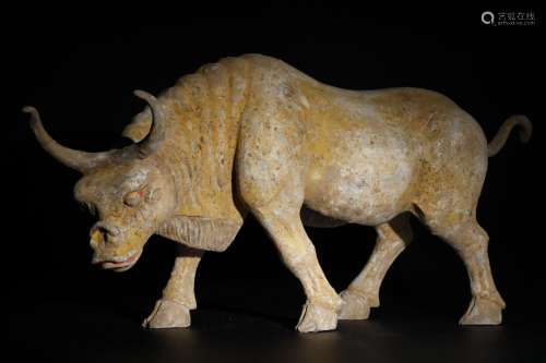 A Painted Pottery Figurine of a bull