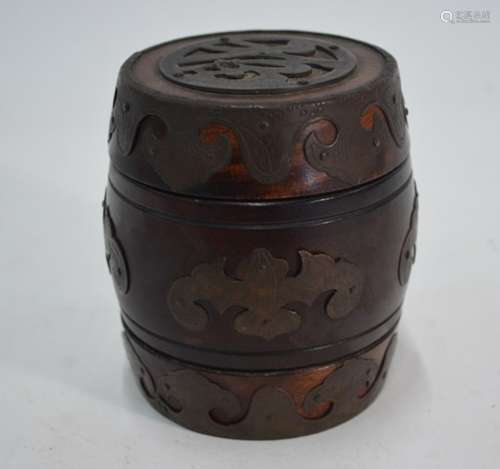 A Chinese hardwood barrel form caddy