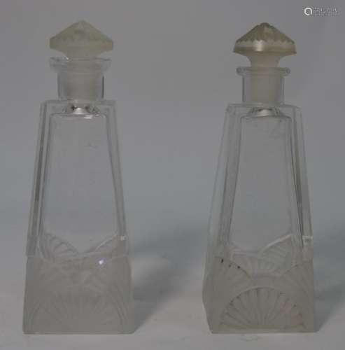 A pair of Art Deco square based scent bottles and stoppers