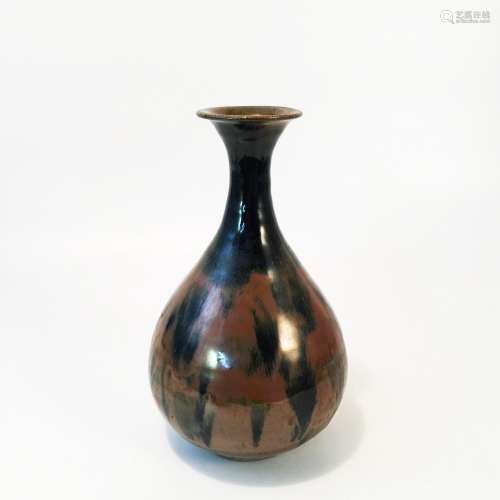 A Black-Glazed Spring Vase with brown spots