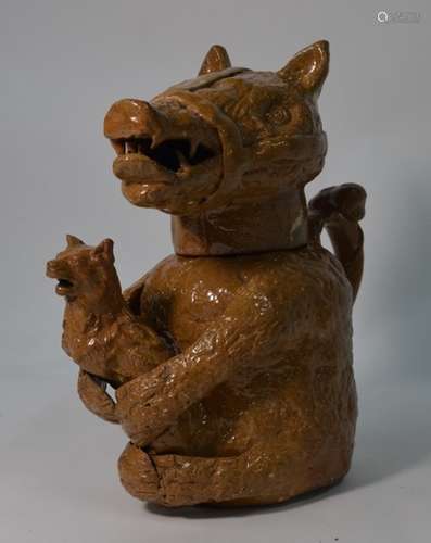 A 18th century style Staffordshire glazed earthenware bear baiting jug