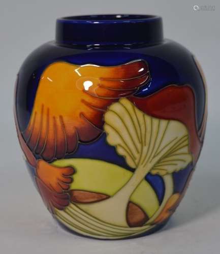 A modern Moorcroft Pottery vase decorated with mushrooms