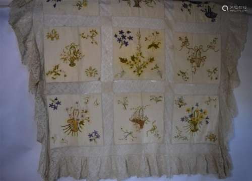 An embroidered ivory silk and 19th century lace coverlet etc.