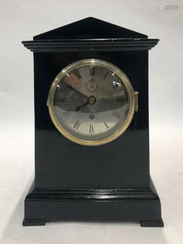 A WWII period vaulted and ebonised mantle clock, the eight day movement No.19370 by W Elliot 1942