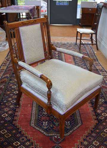 A late 19th/20th century boxwood inlaid rosewood salon open armchair