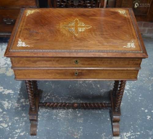 A 19th century continental inlaid mahogany work table