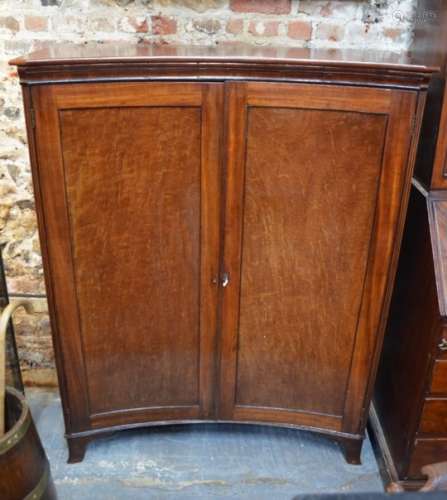 A Victorian mahogany inverted bow-fronted cabinet