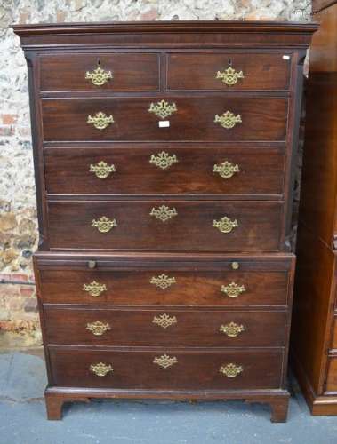 A George III mahogany chest on chest, the moulded cornice over two short and three long drawers