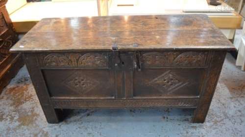 A 17th century lunette carved English oak coffer