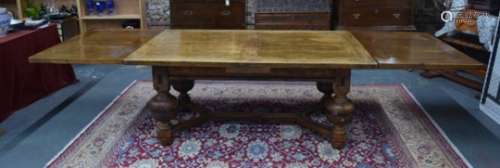 A Dutch 17th century and later oak draw-leaf dining table, of substantial form