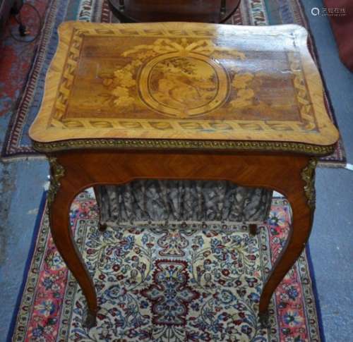 A fine quality ormolu mounted marquetry yew -wood work table, 19th century, in the manner of the cab