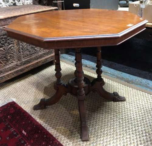 A Victorian Aesthetic period walnut centre table
