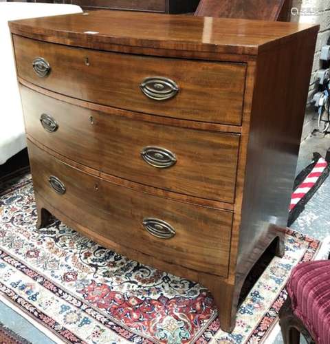 A 19th century mahogany bowfront chest of three long graduated drawers