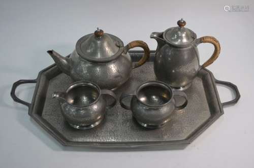 A 'Tudric' planished pewter four piece tea service