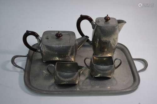 A 'Warric' for Liberty planished pewter four piece tea set and tray