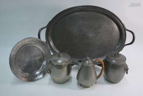 Two Tudric for Liberty planished pewter jars and covers