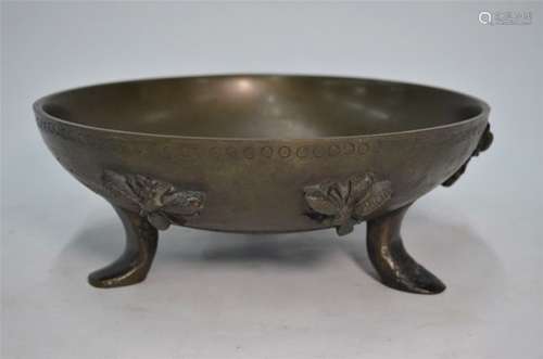 An Art Deco cast bronze bowl with applied relief hornet motifs