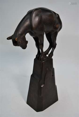 A Swiss Art Deco carved wood chamois goat