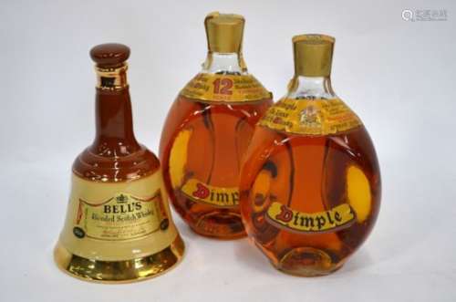 Two Dimple Haig bottles of Whisky and an empty Wade Bells decanter