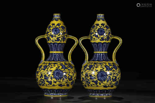 A Pair of Chinese Yellow-grounded Gourd Shaped Porcelain Vases with Interlocking Lotus