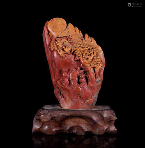 A Carved Landscape and Figural Ornament