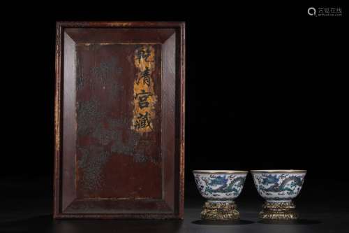 A Pair of Blue and White Porcelian Cups Patterned with Dragon and Phoenix