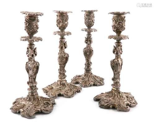 A set of four Victorian electroplated candlesticks…