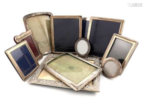 A collection of silver photograph frames, various …