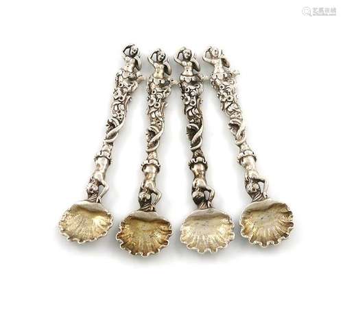 A set of four Victorian cast silver salt spoons, b…