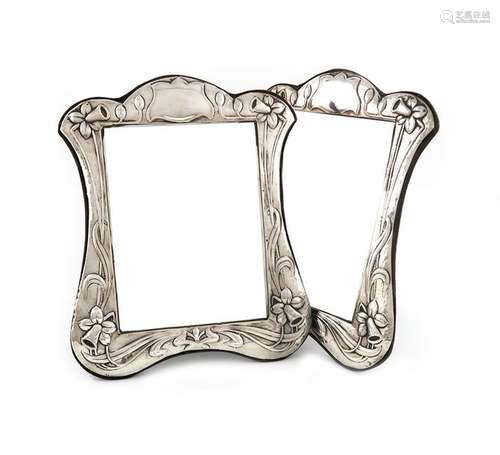 A matched pair of modern silver mirrors, one by Ke…