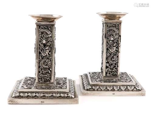 A pair of Chinese silver candlesticks, by Wang Hin…