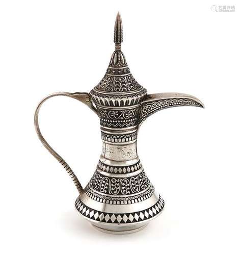 An Oman silver coffee jug, retailed by Jawahir, Om…