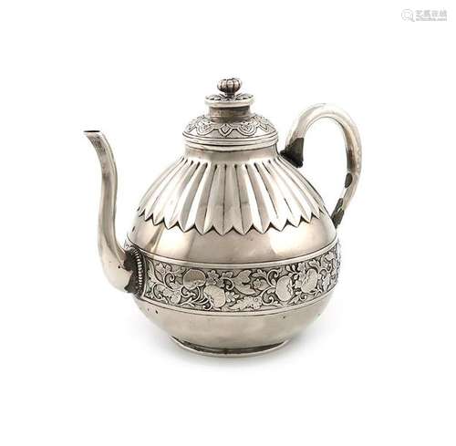 A Japanese silver teapot, the side of the body wit…