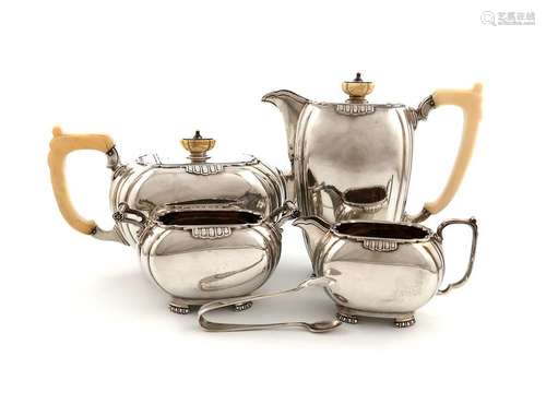 ΛA four piece Art Deco silver and ivory tea set an…