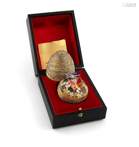 By Stuart Devlin, a modern cased silver gilt, silv…