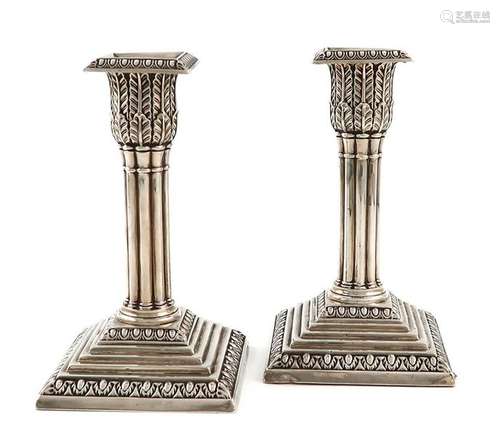 A pair of late Victorian silver candlesticks, by W…