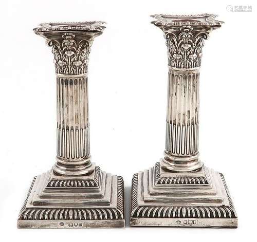 A matched pair of Edwardian silver candlesticks, b…